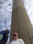 Vicki at the sign